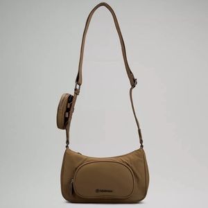 NWT Lululemon crossbody with nano pouch artifact. Offers are welcome!